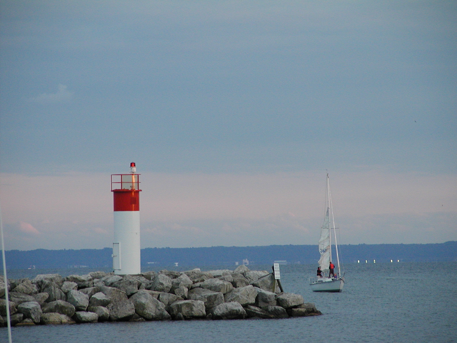 Lighthouse at Port Credit Yacht Club by Jim Carmichael